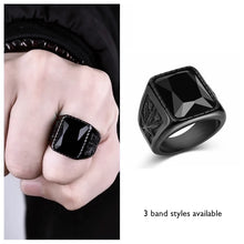 Black stone cocktail / signet ring. For proper gents about town, innit.