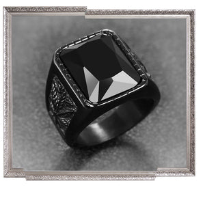 Black stone cocktail / signet ring. For proper gents about town, innit.