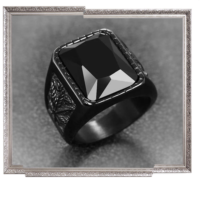 Black stone cocktail / signet ring. For proper gents about town, innit.