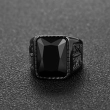 Black stone cocktail / signet ring. For proper gents about town, innit.