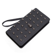 Grrrl's skull purse wallet. Don't mess.