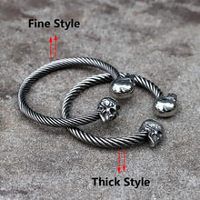 Yeah, it's a stainless steel skull bangle. Who's asking?