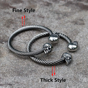 Yeah, it's a stainless steel skull bangle. Who's asking?