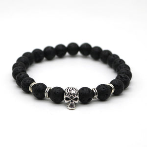 Gold or silver skull bracelet. Black lava stone beads. Nice one.